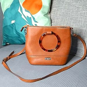 Carlos Santana brown  purse with "tortoise" round handles and crossbody strap